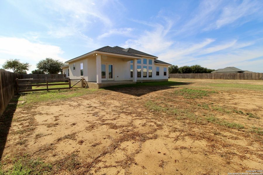 Exterior details and patio area of a home in , Lytle (Image 22).