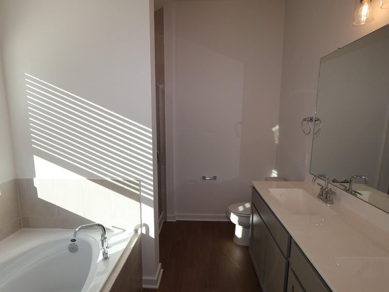 Furnished interior view inside a new home in Pinewood at Grand Texas, New Caney (Image 10).