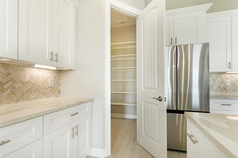 Furnished interior view inside a new home in , Dickinson (Image 7).
