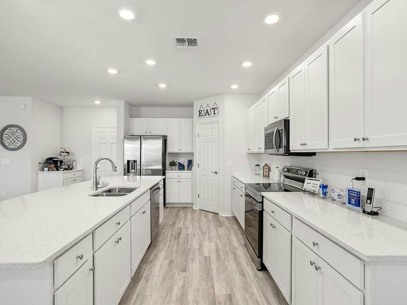 Or, opt for the alternate kitchen option with a large linear island - Wesley II by Highland Homes