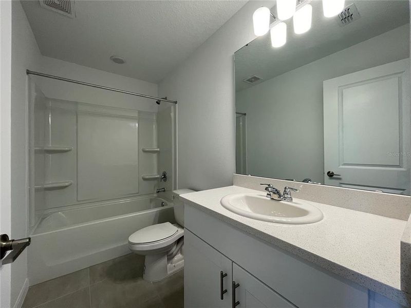 Furnished interior view inside a new home in Seasons at Big Sky, Kissimmee (Image 10).