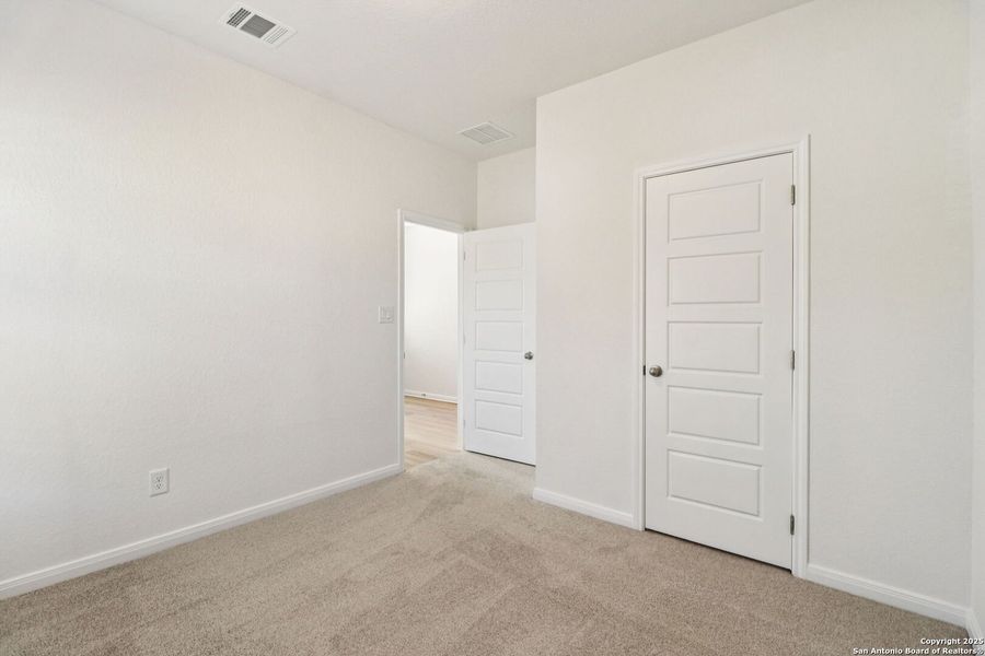 Spacious, unfurnished interior of a new home in Legendary Trails - Classic Series, Cibolo (Image 18). Spacious, unfurnished interior of a new home in Legendary Trails - Classic Series, Cibolo (Image 18).