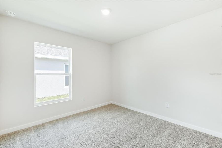 Spacious, unfurnished interior of a new home in Central Parc, North Port (Image 16).