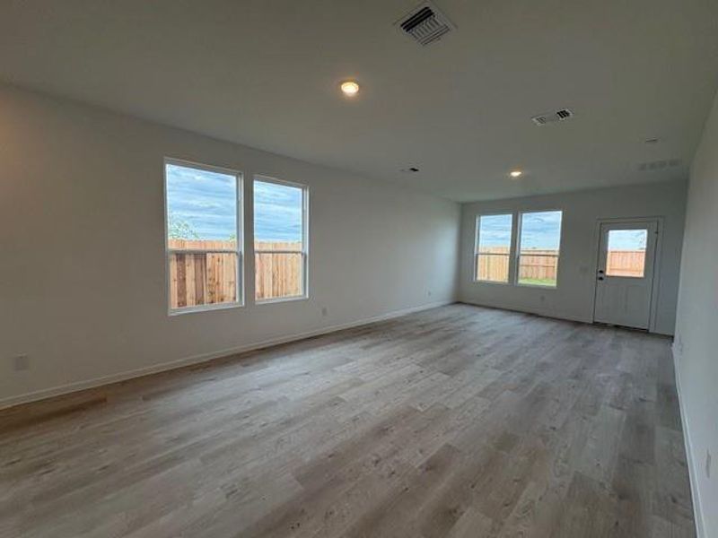 Another view of the dining and living rooms Another view of the dining and living rooms