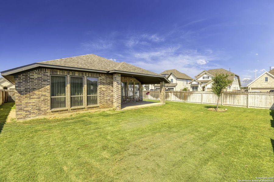 Front exterior of a new home in The Village of Mill Creek 50', Seguin, TX, highlighting curb appeal (Image 1).