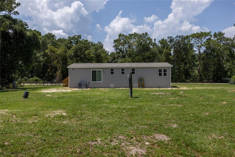 Front exterior of a new home in , Fort White, FL, highlighting curb appeal (Image 22).