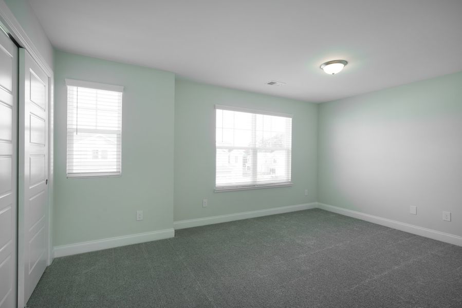 Representative unfurnished interior of a home built from the The Calle by Cothran Homes in Holly Ridge, Greenville (Image 32). Representative unfurnished interior of a home built from the The Calle by Cothran Homes in Holly Ridge, Greenville (Image 32).