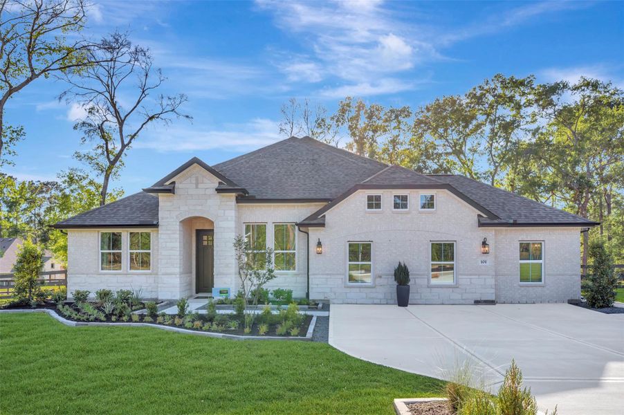 Front exterior of a new home in Lakeview, Waller, TX, highlighting curb appeal (Image 2). Front exterior of a new home in Lakeview, Waller, TX, highlighting curb appeal (Image 2).