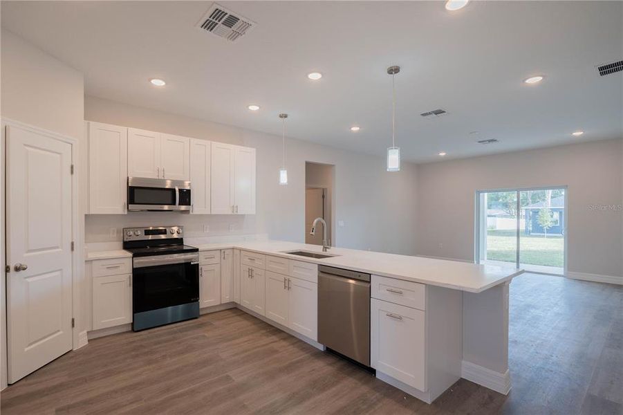 Furnished interior view inside a new home in , Tavares (Image 5).