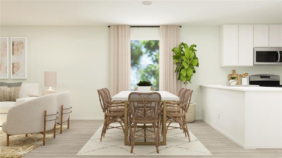 Dining area featuring light hardwood / wood-style flooring