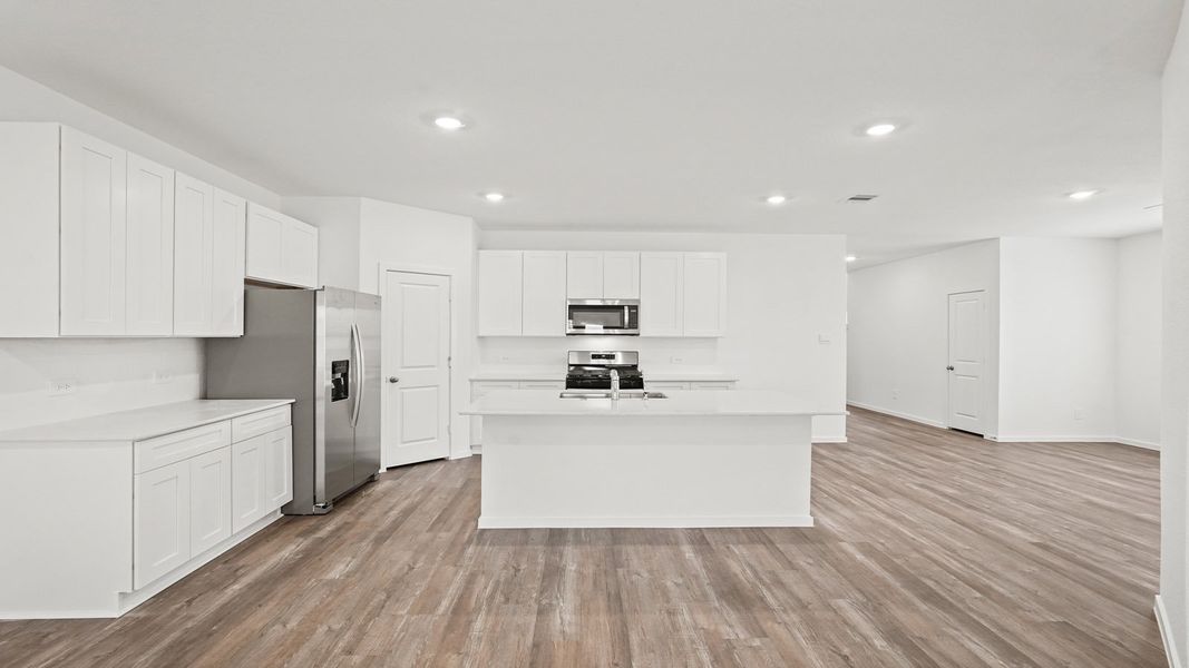 Furnished interior view inside a new home in Sunterra, Katy (Image 7).