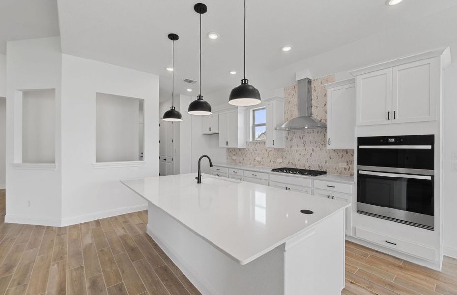 Furnished interior view inside a new home in Bluffview Reserve, Leander (Image 12).