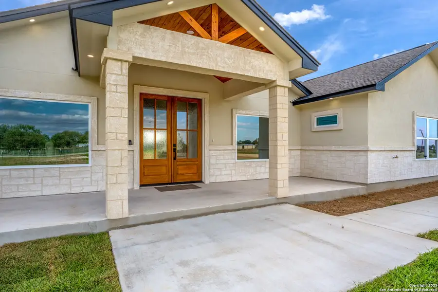 Front exterior of a new home in , San Antonio, TX, highlighting curb appeal (Image 2).
