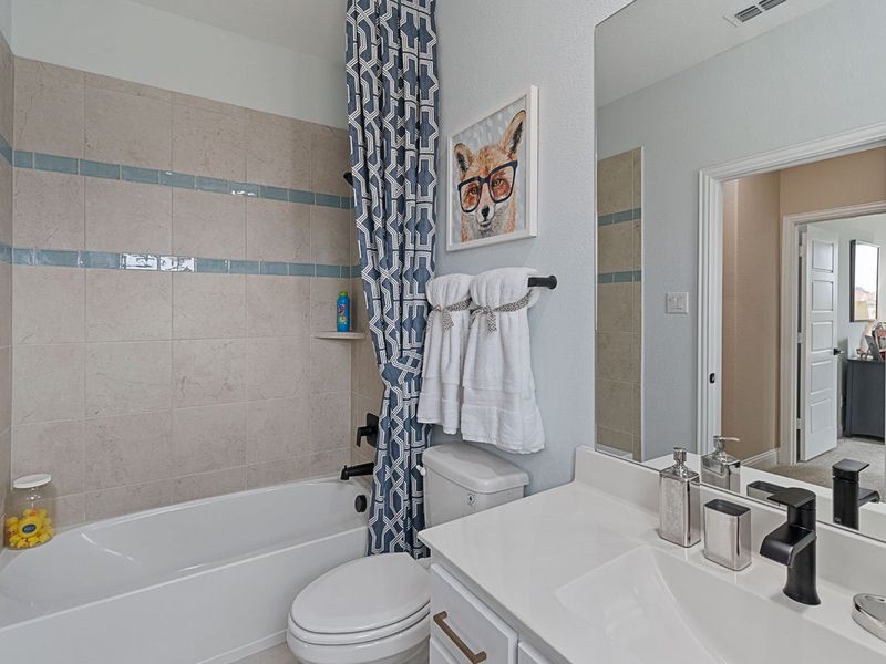 Representative furnished interior of a home built from the Middleton by Landon Homes in Lexington Frisco, Frisco (Image 28).
