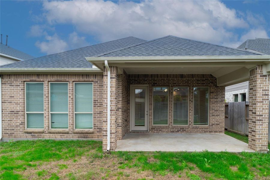 Exterior details and patio area of a home in Cross Creek West 45', Fulshear (Image 4). Exterior details and patio area of a home in Cross Creek West 45', Fulshear (Image 4).
