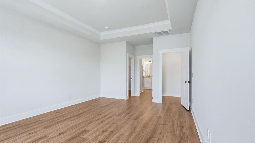 Highly skilled design shines in this elegant, restful primary suite near Downtown Spartanburg, SC