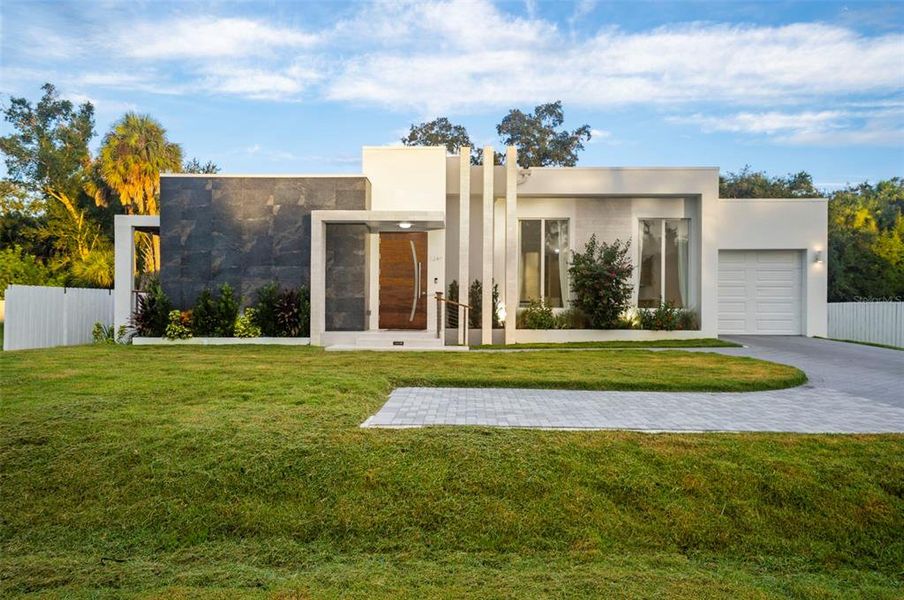 Front exterior of a new home in , North Port, FL, highlighting curb appeal (Image 26).