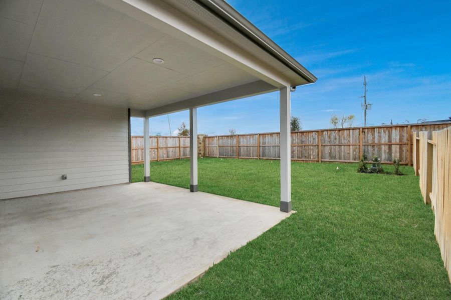 Come and see this spacious backyard with its beautiful covered patio. There is plenty of room for the kids to play and adults to relax. Perfect for your outdoor living space, patio furniture, bbq pit, and so much more. The possibilities are endless!