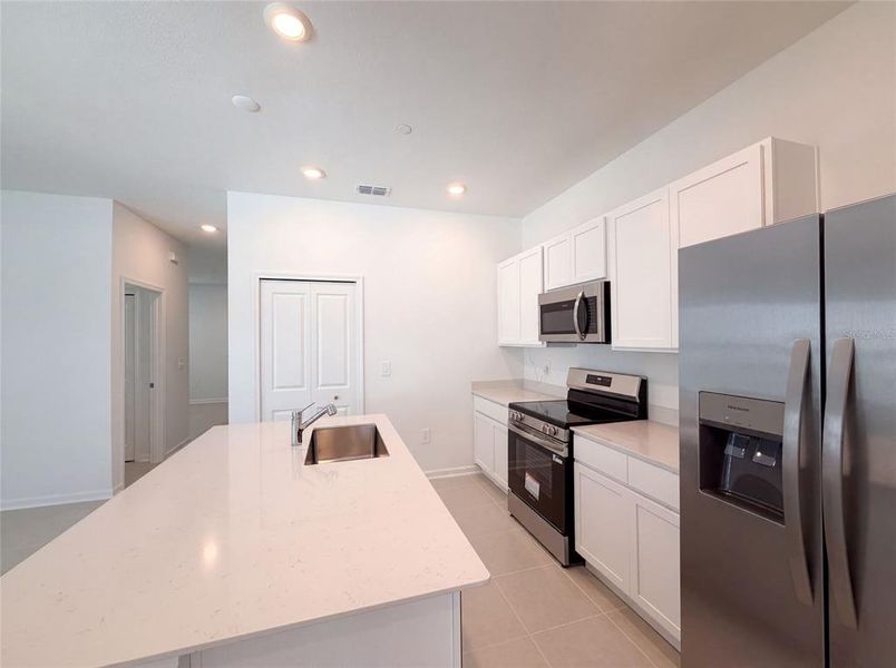 Furnished interior view inside a new home in , Apopka (Image 5).