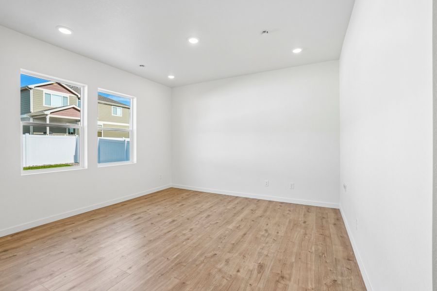 Spacious, unfurnished interior of a new home in Union Colony West, Greeley (Image 36).