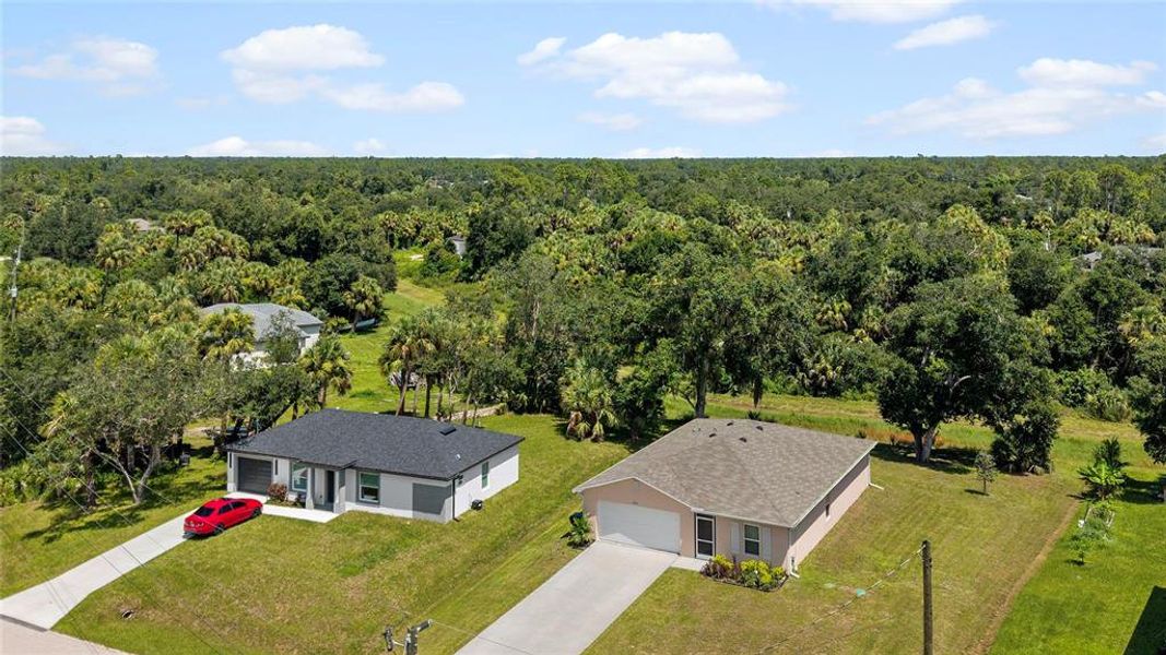 Front exterior of a new home in , North Port, FL, highlighting curb appeal (Image 26).