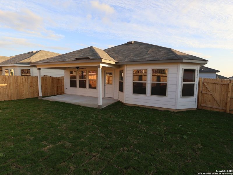 Exterior details and patio area of a home in Greenspoint Heights, Seguin (Image 25).
