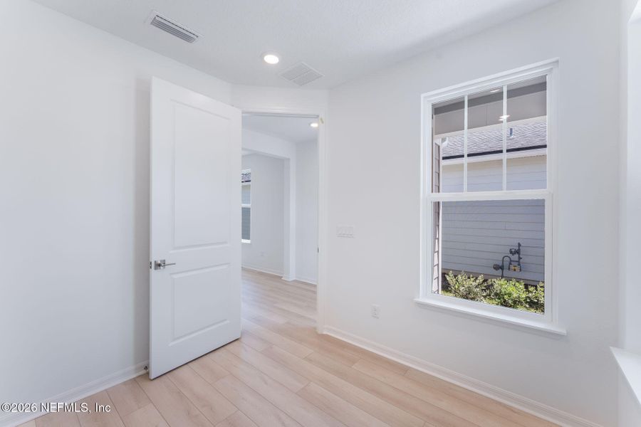 Spacious, unfurnished interior of a new home in Del Webb Wildlight, Yulee (Image 21).