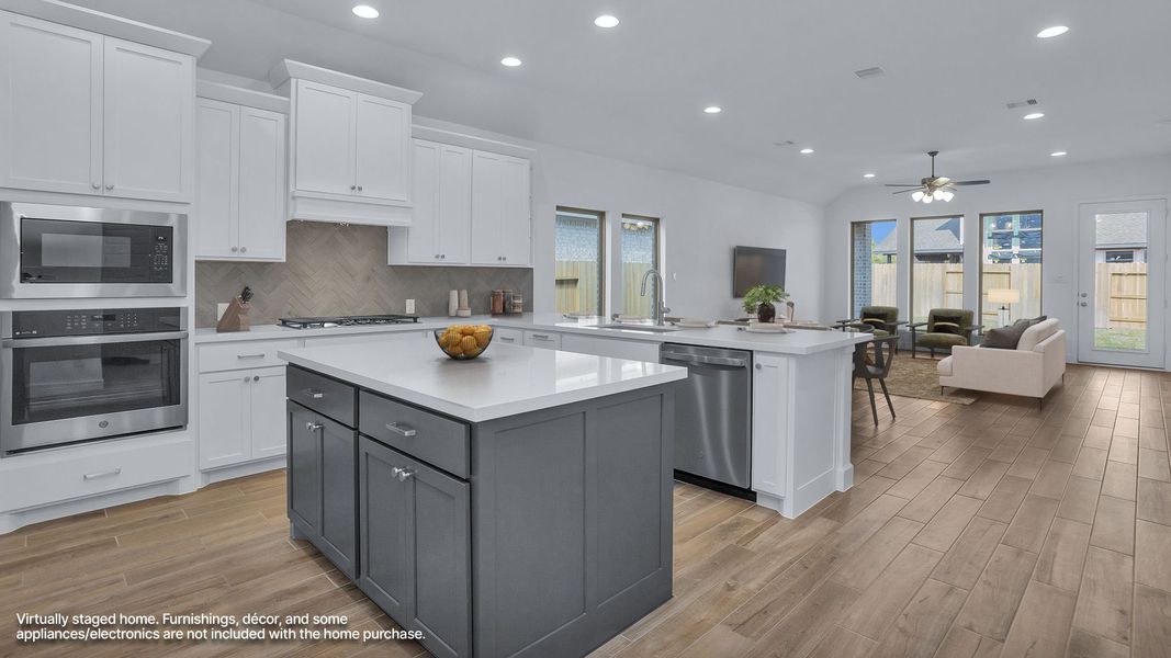 Furnished interior view inside a new home in Grand Central Park, Conroe (Image 3).