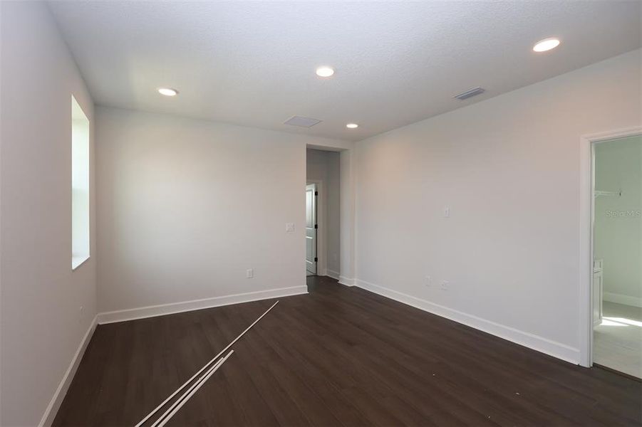 Spacious, unfurnished interior of a new home in Lake Star at Ovation, Winter Garden (Image 32).