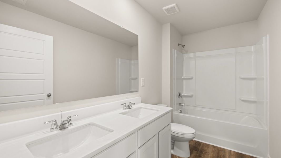 Furnished interior view inside a new home in The Preserve at Agricultural Village, Perry (Image 11).