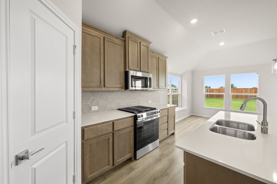 Furnished interior view inside a new home in Meadow Park at The Meadows, Ponder (Image 9).
