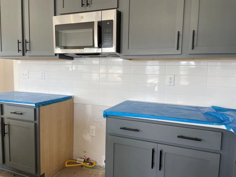 Kitchen featuring the AW Collection® Minimalist - Bold surfaces, clean lines, modern edge. Kitchen featuring the AW Collection® Minimalist - Bold surfaces, clean lines, modern edge.