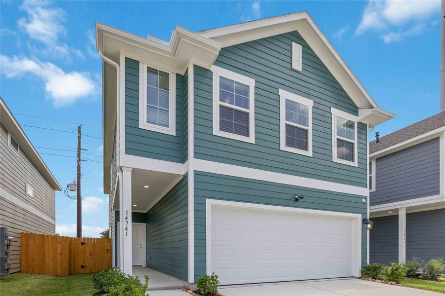 Front exterior of a new home in , Houston, TX, highlighting curb appeal (Image 1). Front exterior of a new home in , Houston, TX, highlighting curb appeal (Image 1).