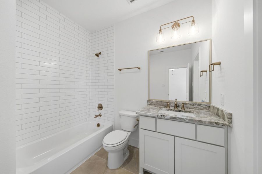 Furnished interior view inside a new home in Legacy, League City (Image 20).