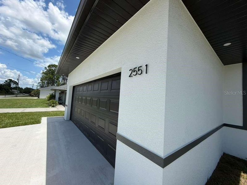 Exterior details and patio area of a home in , North Port (Image 24).