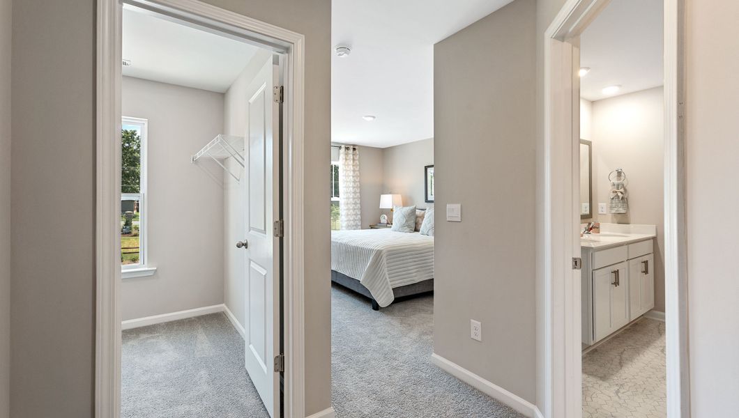 Furnished interior view inside a new home in Tanglewood Townes, Greenville (Image 17).