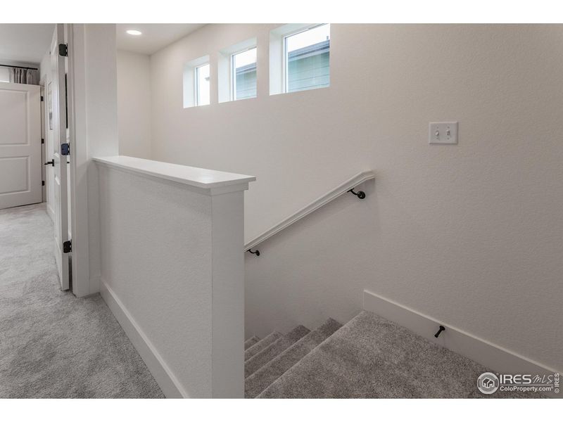 Spacious, unfurnished interior of a new home in Prairie Song Story Collection - Single Family Homes, Windsor (Image 19).