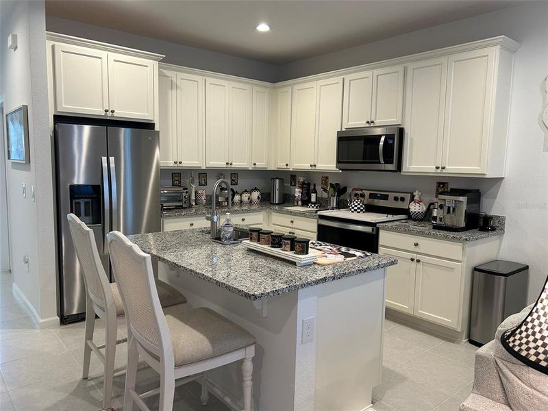 Furnished interior view inside a new home in , Winter Garden (Image 16).