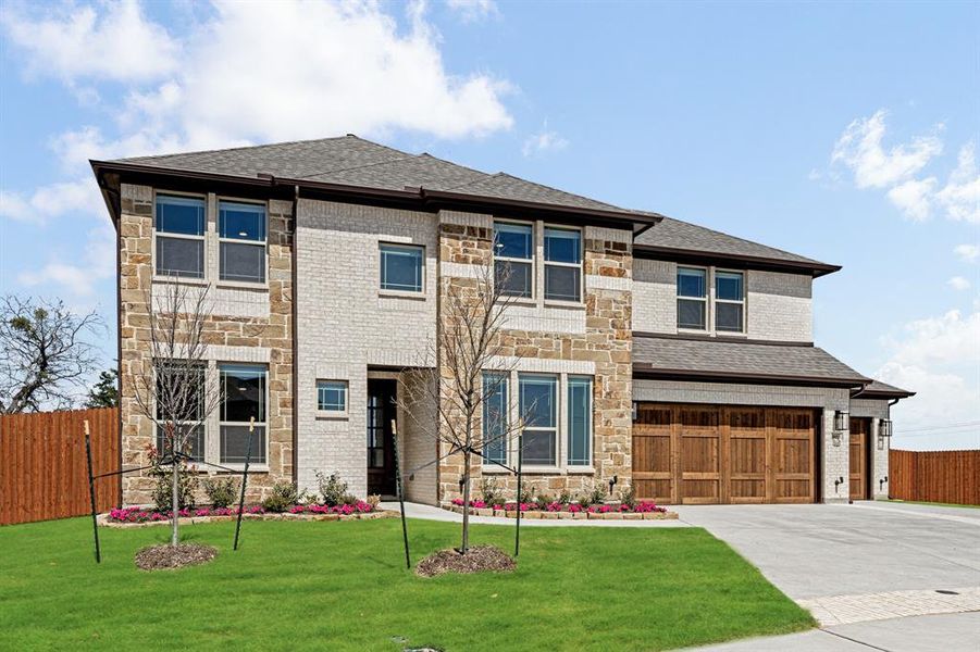 Front exterior of a new home in Villages of Walnut Grove, Midlothian, TX, highlighting curb appeal (Image 2). Front exterior of a new home in Villages of Walnut Grove, Midlothian, TX, highlighting curb appeal (Image 2).