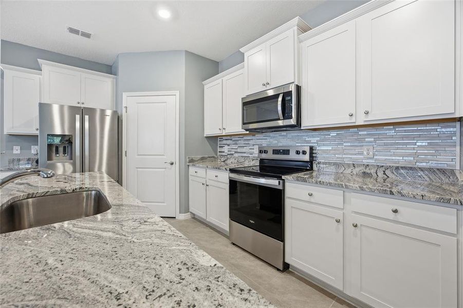 Furnished interior view inside a new home in JB Ranch, Ocala (Image 9).