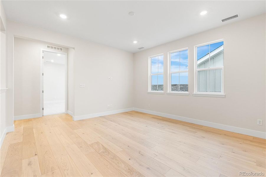 Spacious, unfurnished interior of a new home in Luxe at The Canyons, Castle Pines (Image 42).