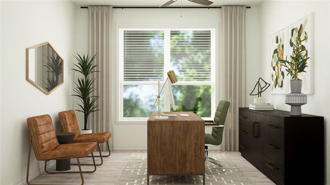 Living area featuring hardwood / wood-style flooring, a healthy amount of sunlight, and ceiling fan