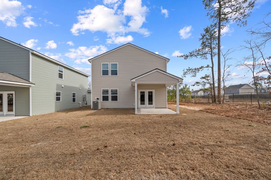 Exterior details and patio area of a home in Grand Arbor, Blythewood (Image 3).