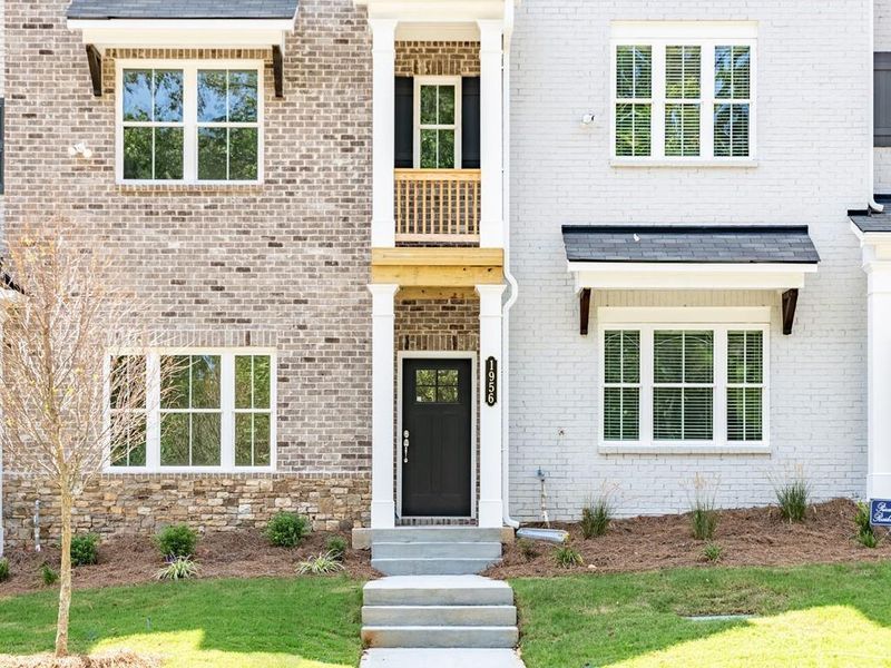 Exterior details and patio area of a home in Townes at South Main, Kennesaw (Image 3).