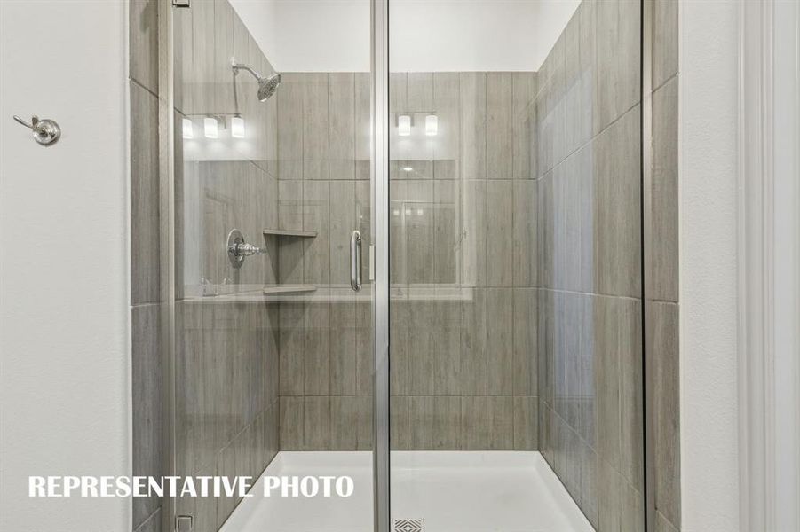 The spacious walk in shower in our Hampton plan is the perfect place to start or end your day!  REPRESENTATIVE PHOTO