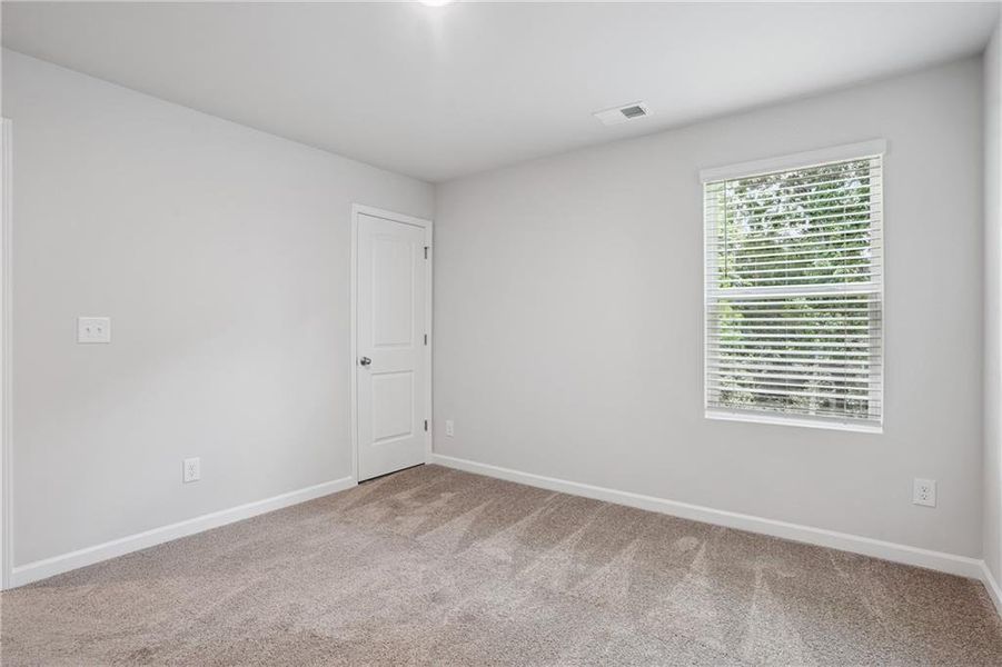 Spacious, unfurnished interior of a new home in River Walk Farm, Covington (Image 29).