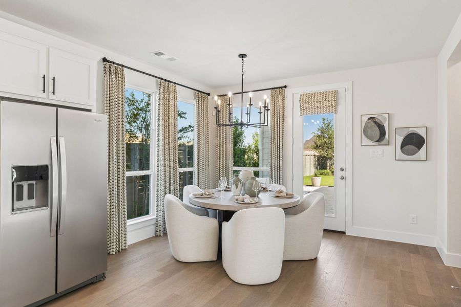 Sunlit Dining Space in American Legend Homes - Plan 1462 Representative Photo