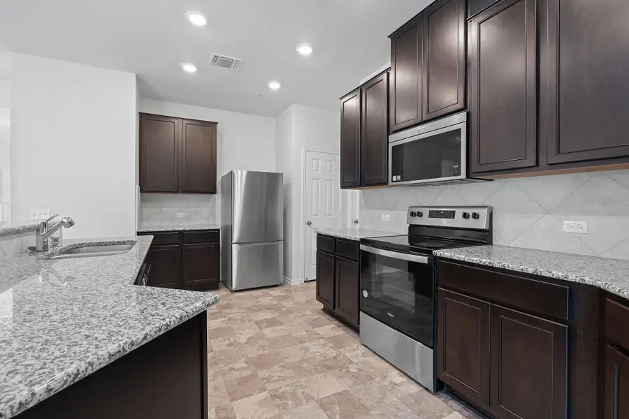 Furnished interior view inside a new home in EastVillage - Heritage Collection, Manor (Image 7). Furnished interior view inside a new home in EastVillage - Heritage Collection, Manor (Image 7).