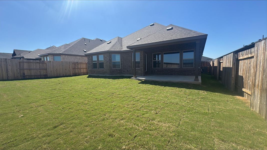Exterior details and patio area of a home in Sunfield, Buda (Image 3).