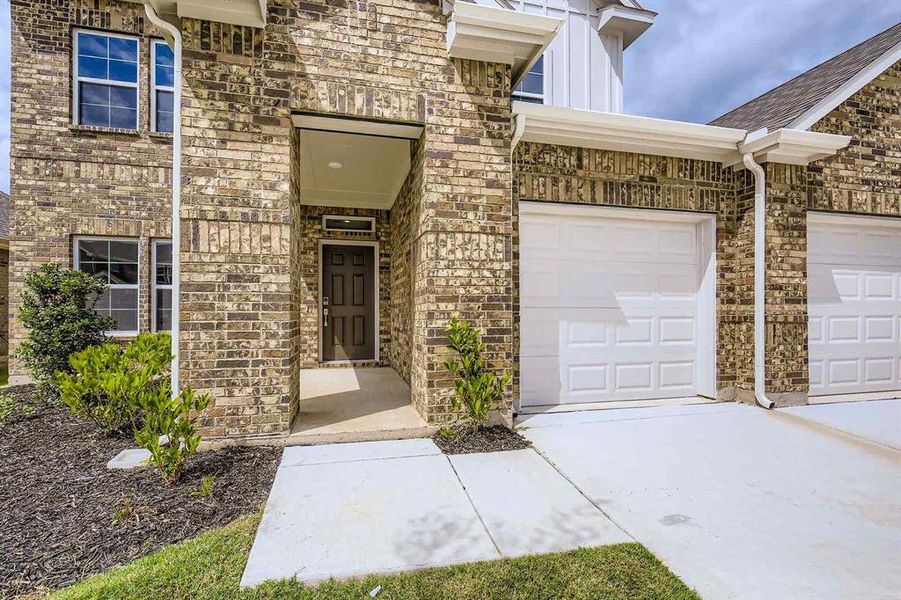Exterior details and patio area of a home in Prestige Collection at Overland Grove, Forney (Image 17).